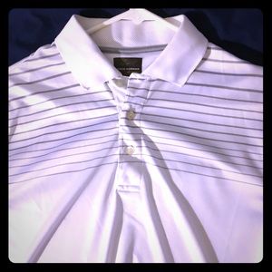 2 Greg Norman Shark golf polos.
